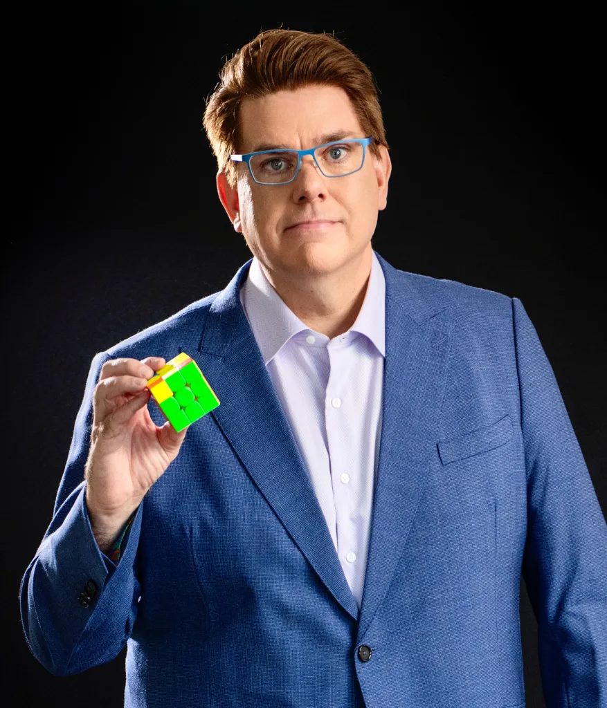 Jim Hogan holding a Rubik’s Cube